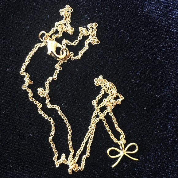 Gold colored metal bow necklace/pendant. - Picture 3 of 5